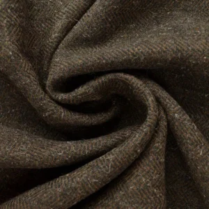 BRUN ULL/POLYESTER TYG MED TWEEDSTRUKTUR OCH SILLBENSMÖNSTER